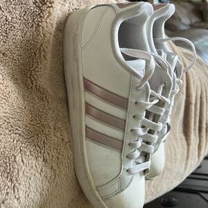 Adidas white tennis shoes with rose gold stripes 7